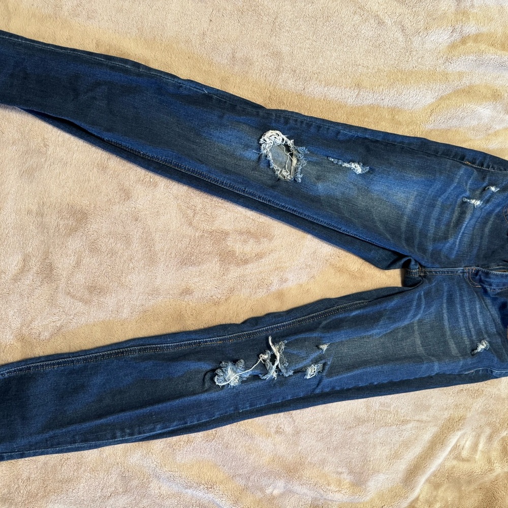 Women's Distressed Blue Jeans